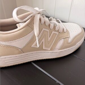 Beige and White New Balance Sneakers